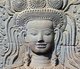 Cambodia: A smiling apsara at Angkor Wat - this apsara is the only one out of almost two thousand at Angkor Wat who is showing her teeth (11th century)